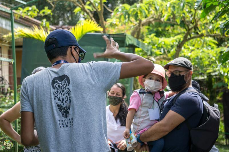 Guide explaining about animals